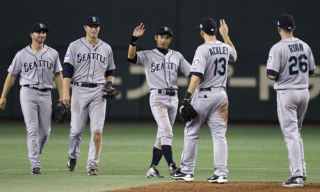 The Seattle Mariners celebrate a rare play well done